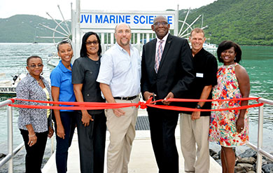 UVI administrators cut ribbon at dock opening ceremony